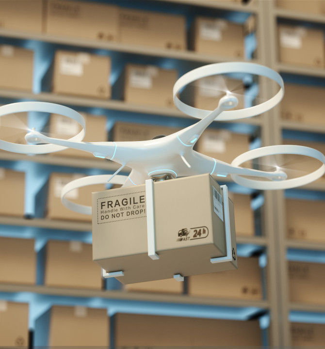 3D rendering of a quadcopter drone carrying a cardboard box in a warehouse